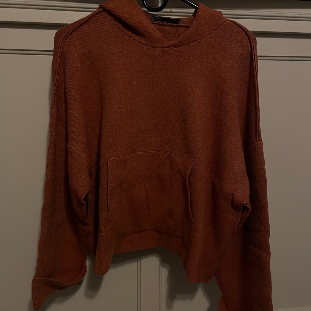 Orange knit sweater